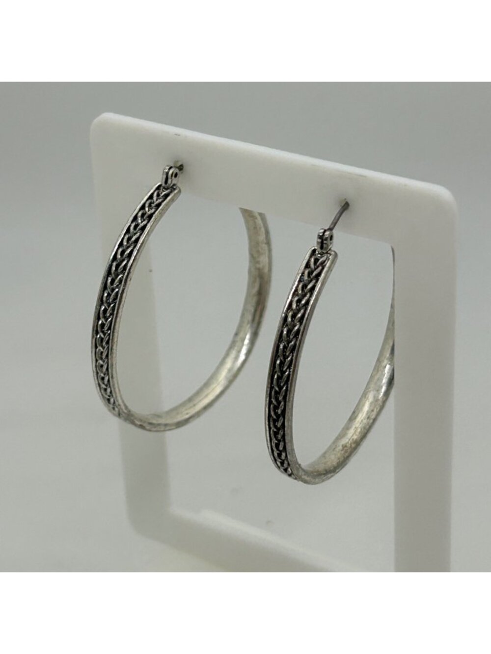 Silver Tone Hoop Earrings Textured Etched Pattern Saddle bare Closure